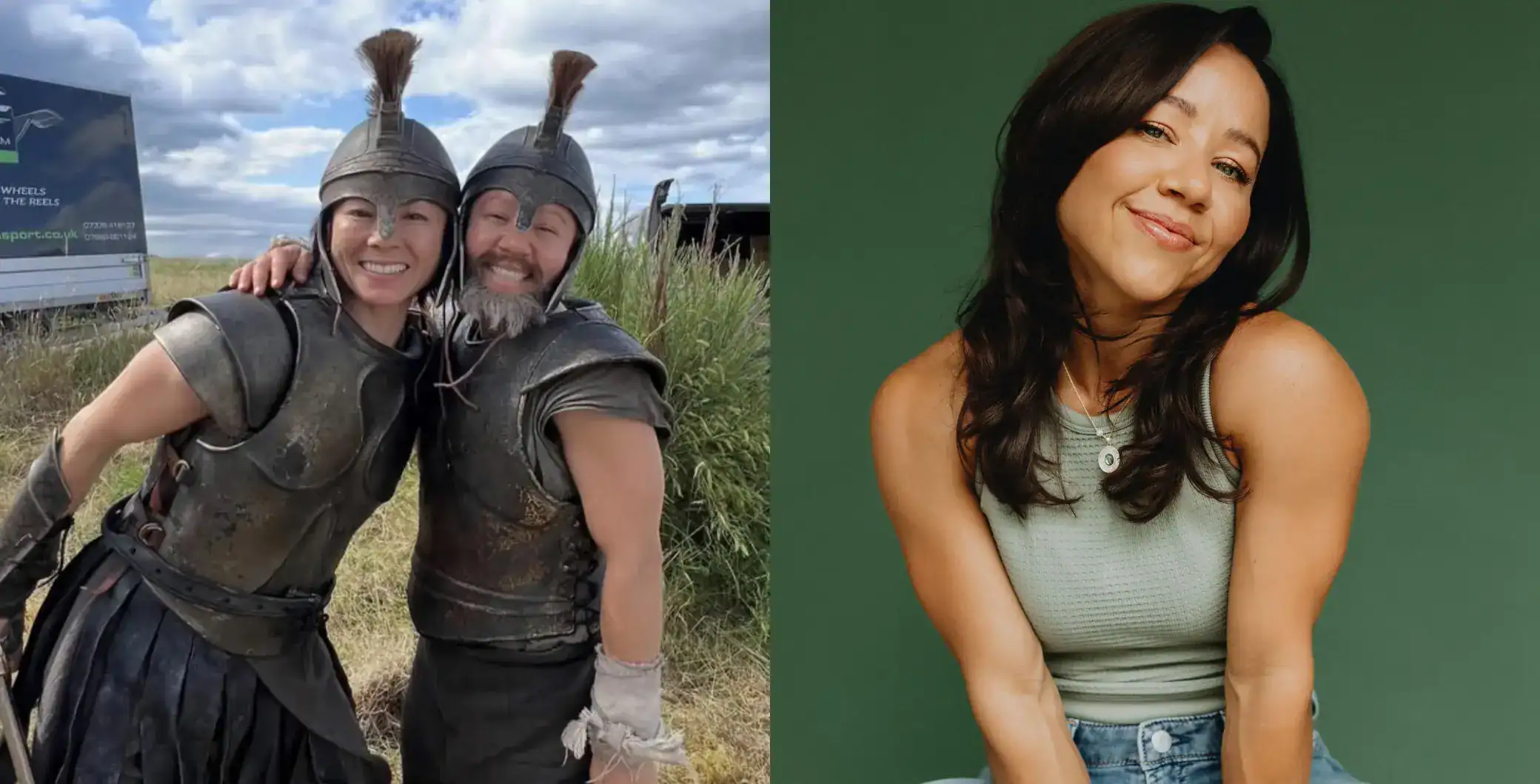 Two women dressed as Roman soldiers smiling outdoors with a cloudy sky.