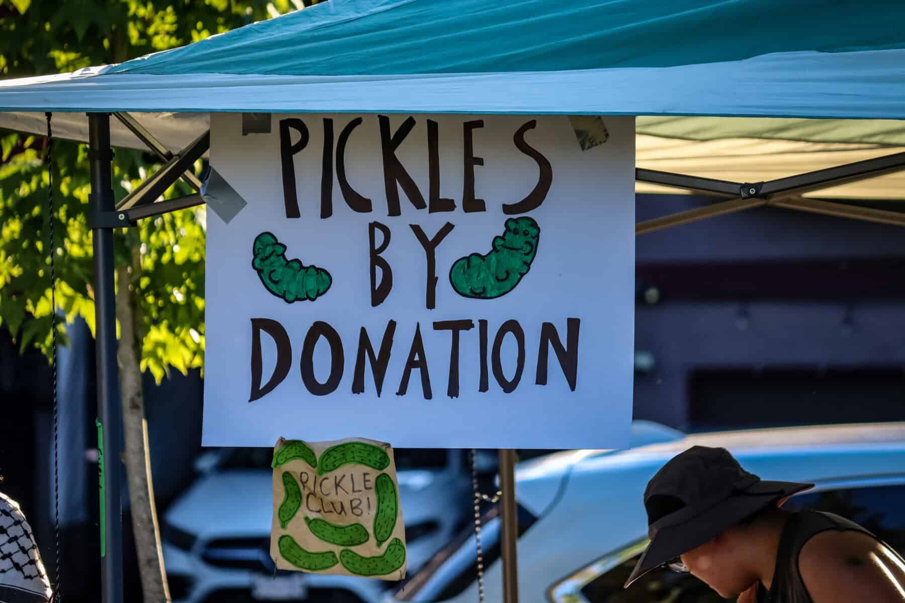 Pickles by donation sign at Vancouver Trans March event.