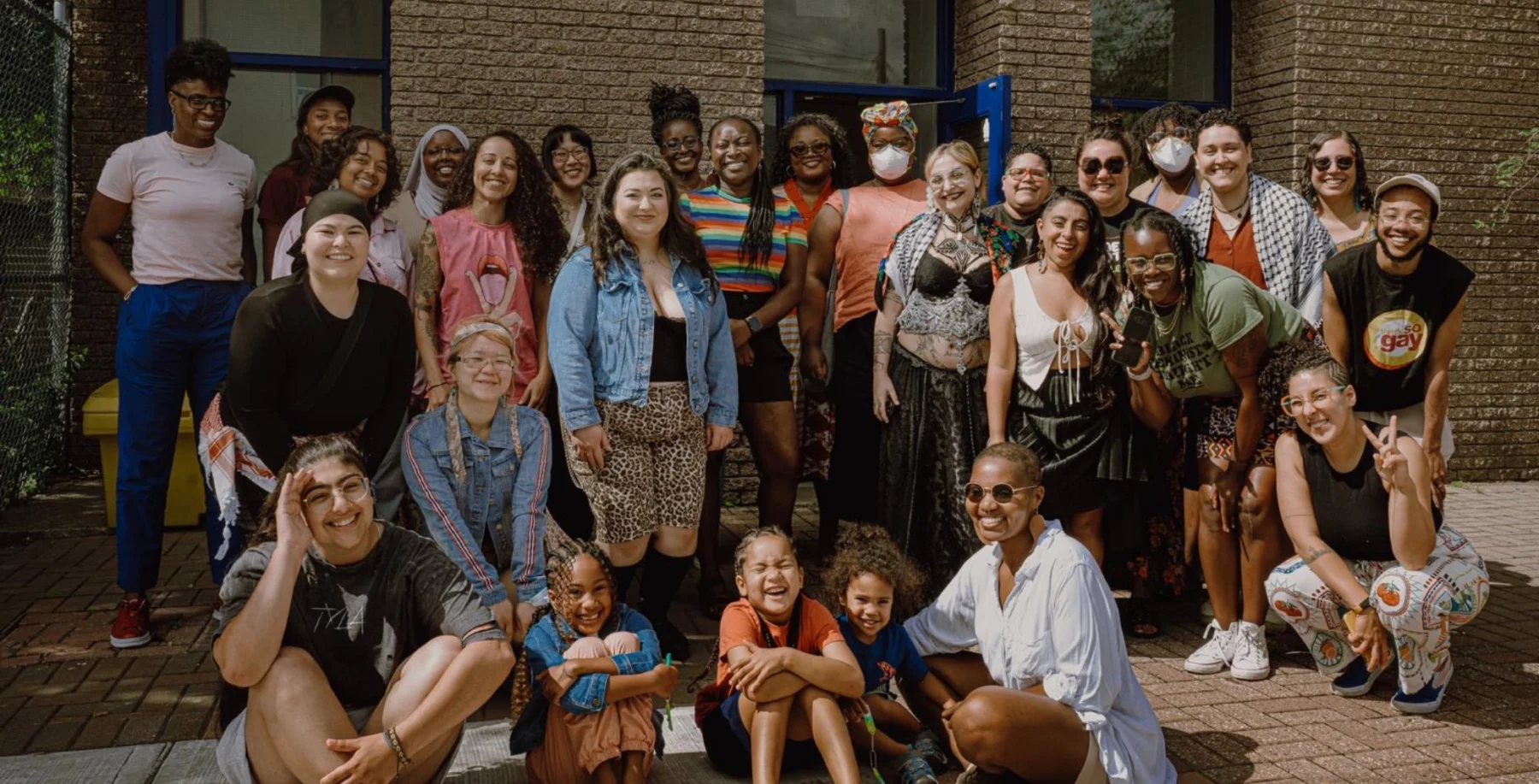 Diverse group of people celebrating at Ottawa Pride event in Ottawa, Canada.